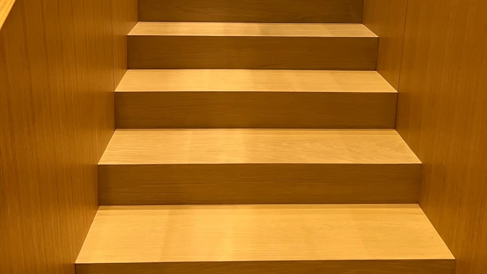 Finished hardwood staircase built by WP High Quality Carpentry Corp
